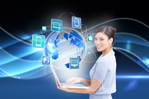 Digital composite of happy businesswoman using laptop with interface and globe