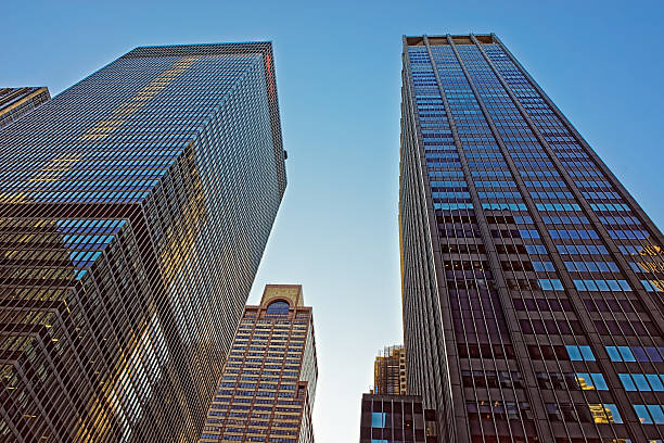 istock Skyscrapers rising up to deep blue sky in New York 496162444