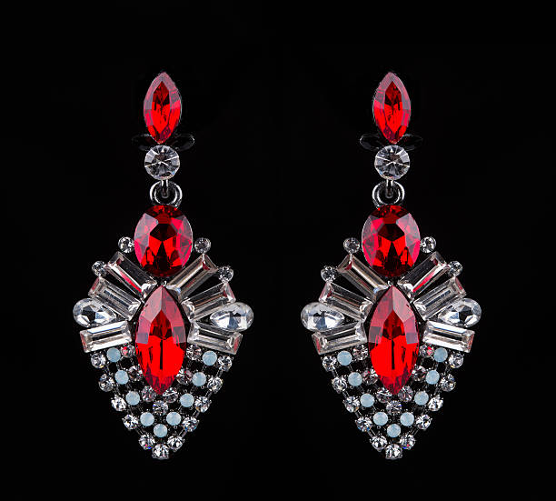 istock earring with colorful red gems on black background 496163092