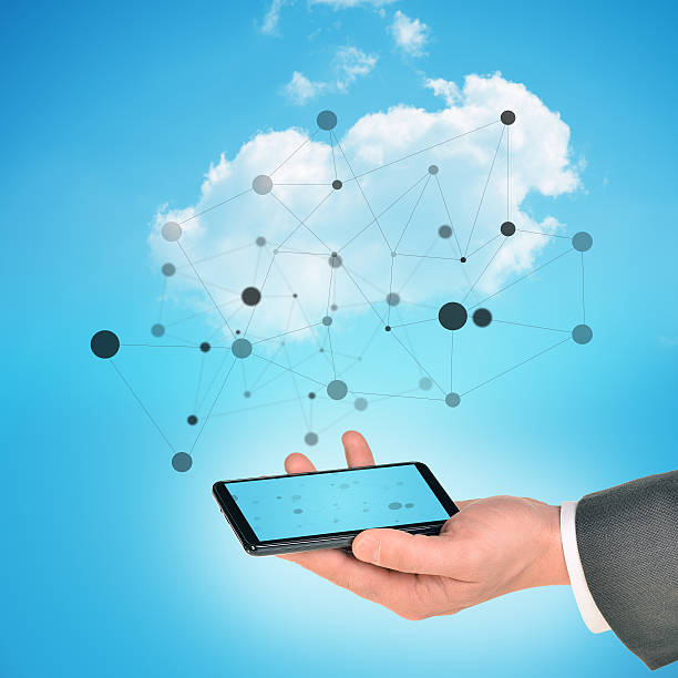 istock Businessman hand holding smartphone 496165448