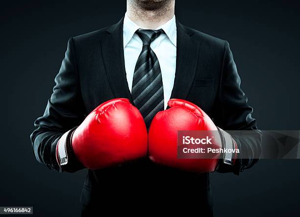 Foto de Empresário Com Luvas De Boxe e mais fotos de stock de Boxe - Esporte - Boxe - Esporte, Luva de Boxe, Negócios
