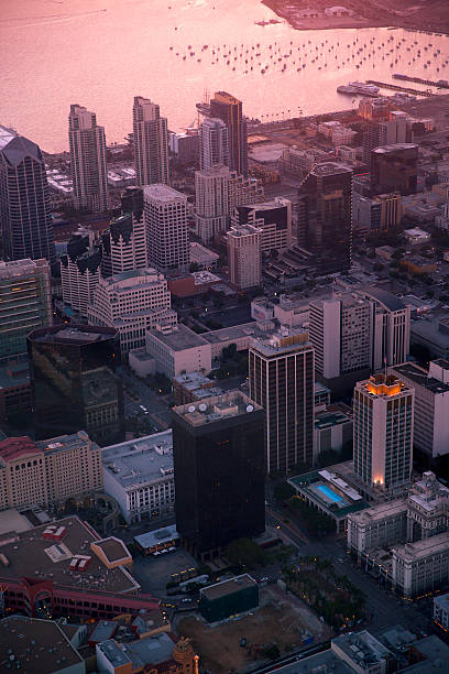 This is a photo taken from a Helicopter of Downtown San Diego at Dusk. There is a lot of space for copy or cropping.