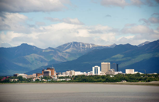 Office Buildings City Skyline Downtown Anchorage Alaska United States A summer day looking across the bay from Point Woronzof anchorage alaska photos stock pictures, royalty-free photos & images