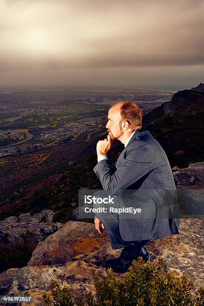 What Does The Future Hold Worried Businessman Considering His Prospects Stock Photo - Download Image Now