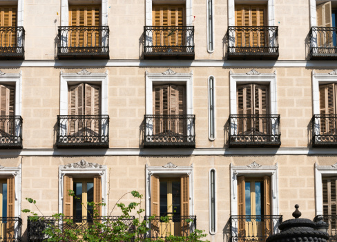Típico ventanales y balcones en una casa en Madrid photo