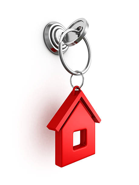istock key with red house trinket in keyhole 496194915