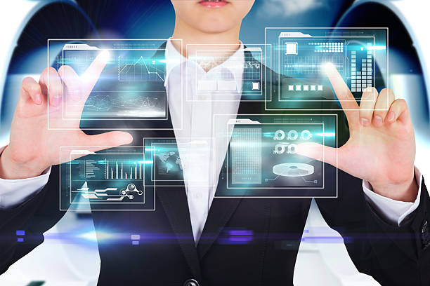 istock Businesswoman touching business interfaces 496196073