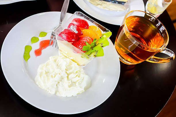 istock Delicious fresh fruit salad served on table wooden 496197893