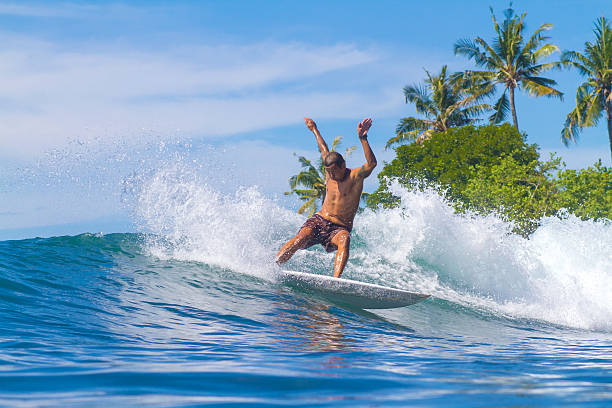 istock Surfing a Wave. Bali Island. Indonesia. 496198003