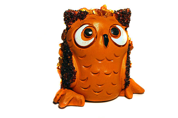 Brown clay figurine owl