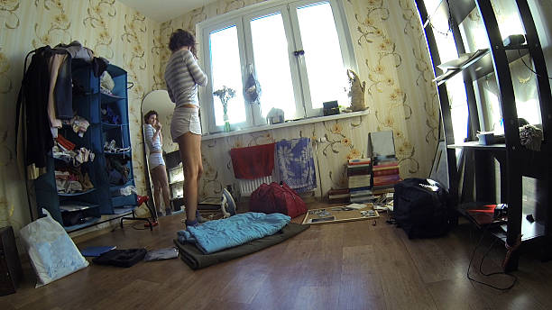 istock woman in her room 496199114