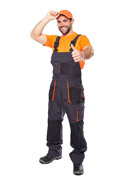 istock Portrait of smiling worker in blue uniform 496199257