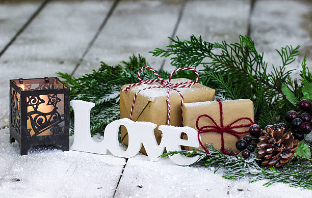 istock Presents, candle and Love on winter background 496200142