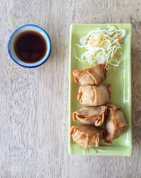 istock gyoza on green plate 496205346