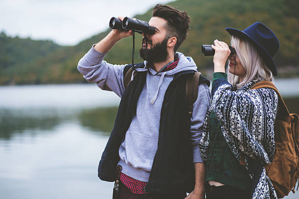 istock Hikers watching the view on the lake 496205358