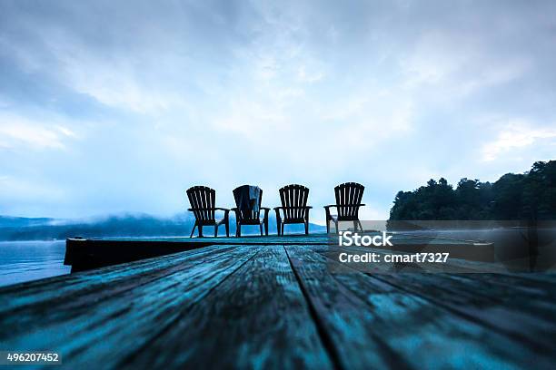 Adirondack Chairs On Dock Stock Photo - Download Image Now - Adirondack Chair, Pier, Riverbank