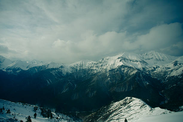 Winter landscape of mountains. Snow-covered mountains. Beautiful mountain landscape.