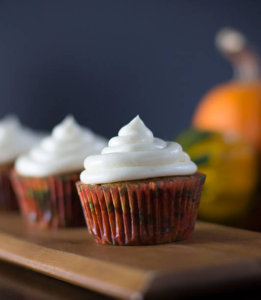 istock Pumpkin Cupcakes and Gourds 496210650