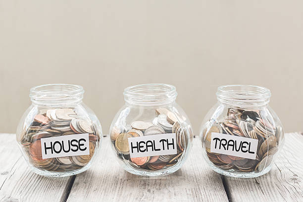 istock Money jar with coins on wood table , Saving Concept 496212742