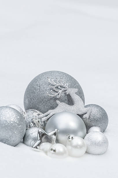 Holiday silver decorative Christmas baubles and star with reindeer