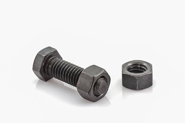 istock Closeup metal screw, bolt and nuts. 496213252