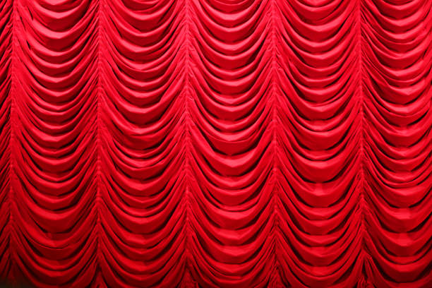 istock Red Stage Curtain close-up 1 496213848