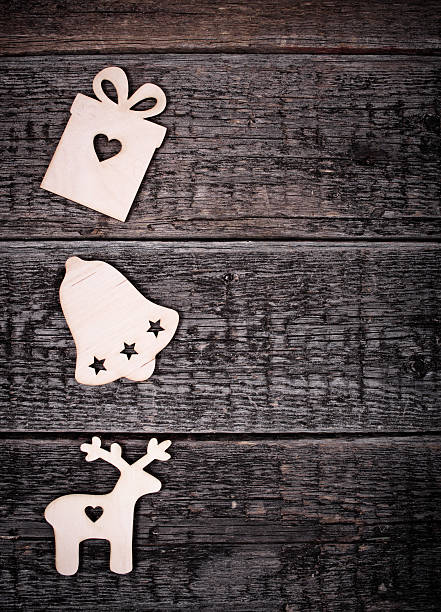 istock Card with Christmas decorations on wooden background 496214292