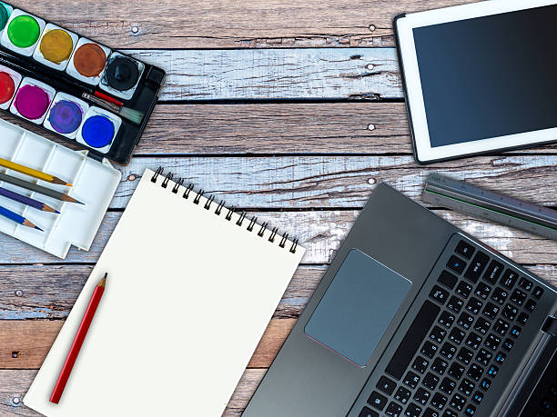 istock Laptop, tablet, sketch book, water color/ creative office equipment concept 496228196