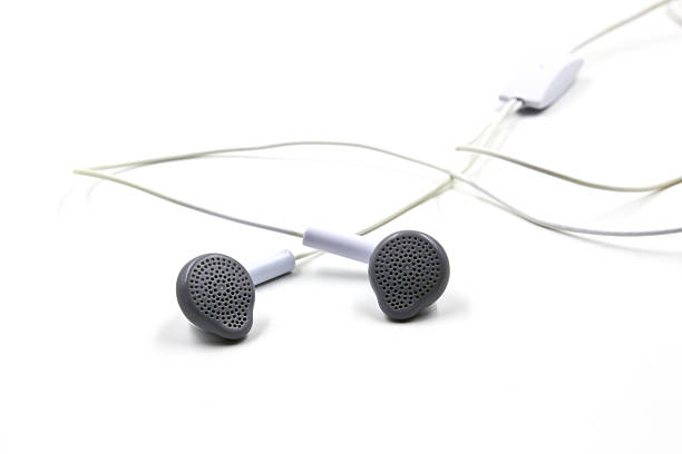 istock White earphones isolated 496231098