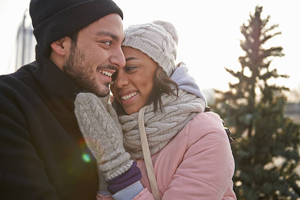 istock Ice skating couple having winter fun 496234266