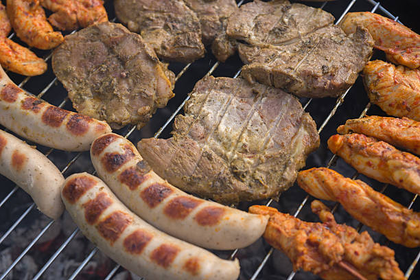 istock Home made barbecue grill on the coal in the nature 496234868