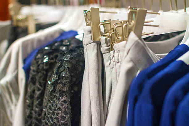 istock gray skirt hangs on a hanger in the storec 496236104