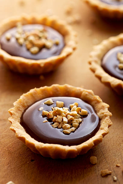 istock Tart with milk chocolate and roasted cashew nuts 496236597