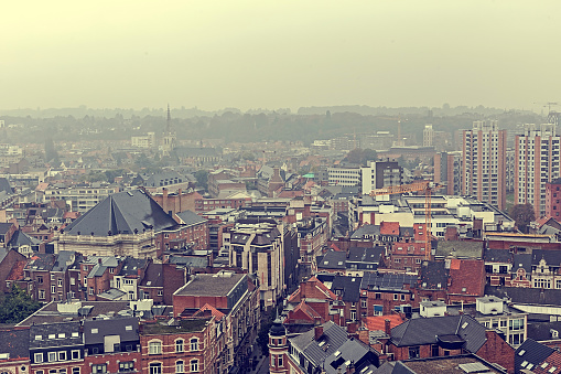 Leuven, Belgium - October 14, 2015: Vintage look with aerial view of Leuven, from university tower, in a rainy day. Leuven is the capital of the province Flemish Brabant in the Flemish Region, Belgium.