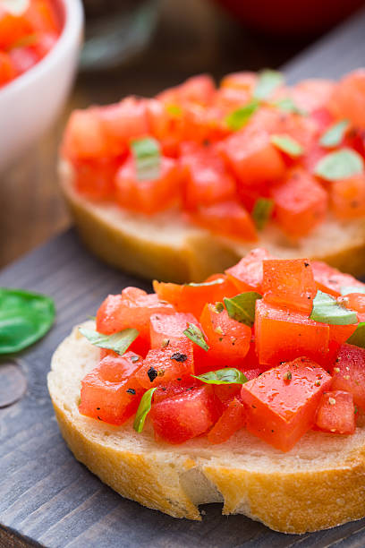 istock Italian bruschetta with tomatoes and basil 496237595