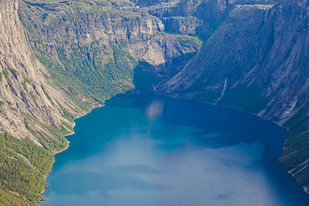 Beautiful Norwegian Summer Panorama Mountain Landscape near Trolltunga, Norway norway, nature, trolltunga, fjord, mountain, landscape, oslo, tongue, troll, hiking, norge, scandinavia, odda, summer, fjords, norwegian, lake, rock, iceland, reykjavik, ringedalsvatnet, hardanger, scandinavian, oslofjord, roldal, sognefjord, beautiful, blue, tourism, nordic, hardangervidda, prekestolen, preikestolen, kjerag, briksdal, Eidfjord, hordalann, Sognefjord, Hardangerfjord, Lysefjord, Geirangerfjord, Nordfjord, Oslofjord, Fjord Norway, Kjeragbolten, Pulpit Rock, Trollstigen, Voringsfossen, Vibrant, norway lysefjorden fjord norwegian currency stock pictures, royalty-free photos & images