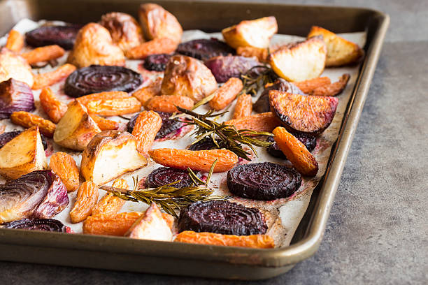 Rosemary roasted root vegetables stock photo