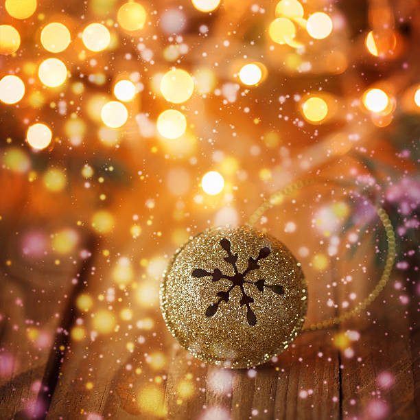 istock Gold Metal Jingle Bell with snowflake with boke 496241284