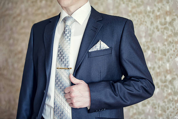 Man In Blue Suit With Tie Tie Clip And Handkerchief Stock Photo - Download  Image Now - iStock