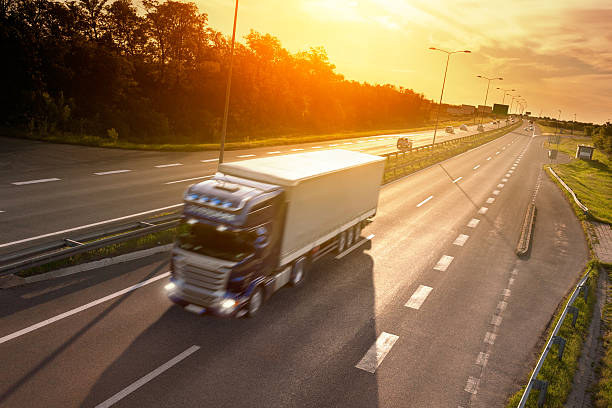 istock Blue truck in motion blur on the highway 496242935