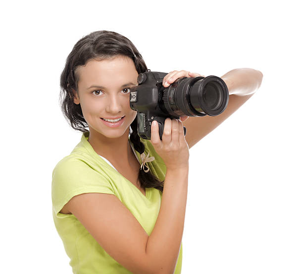 istock Beautiful young woman with camera.Isolated on white background 496243101