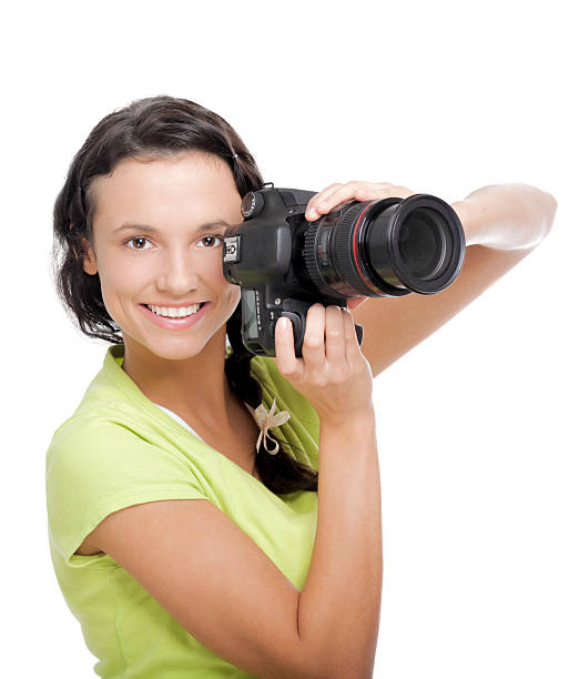 istock Beautiful young woman with camera.Isolated on white background 496243331