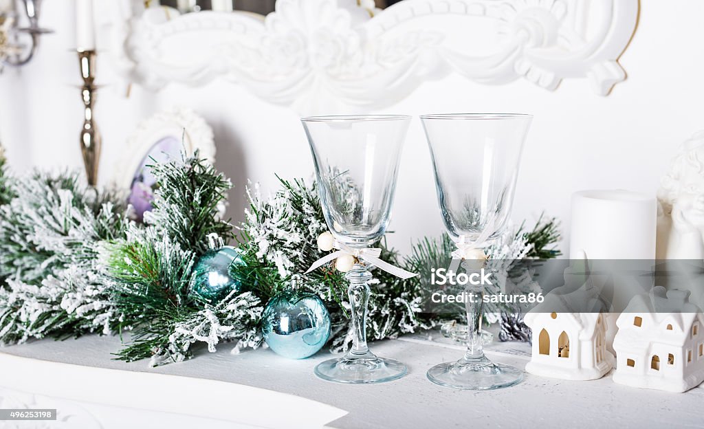 Christmas decorations, white houses Christmas decorations, two white houses and fur-tree branch 2015 Stock Photo