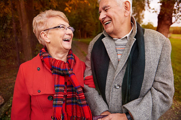 istock Senior couple outdoors having great fun 496253234