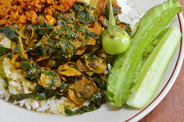 istock cockle curry with betel leaves and vegetable on rice 496253906