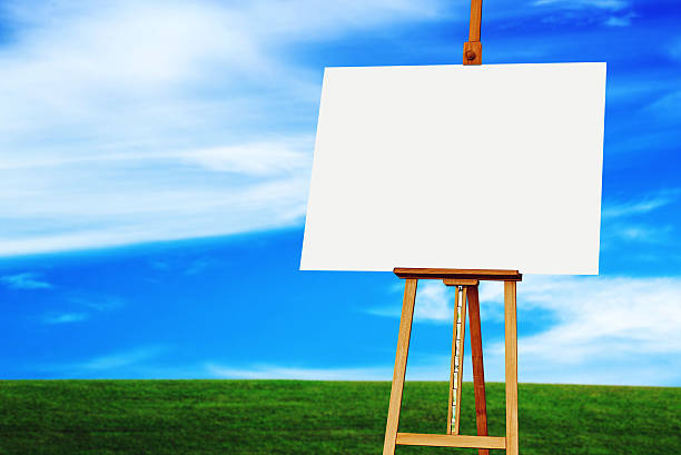 istock Easel with Blank Art Canvas in Grassland 496255314