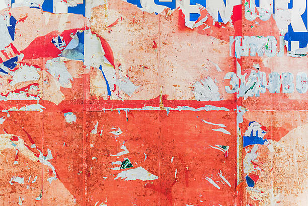 istock Ripped billboard paper as grunge texture 496255990