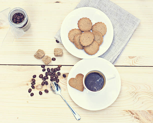 istock Ginger biscuits, cinnamon, a cup of hot coffee. 496257912