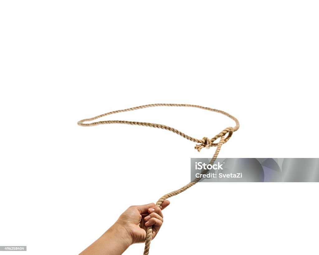 The hand throws a lasso Lasso Stock Photo