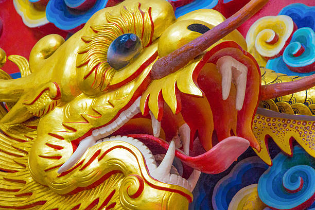 istock Face of gold dragon. 496260629
